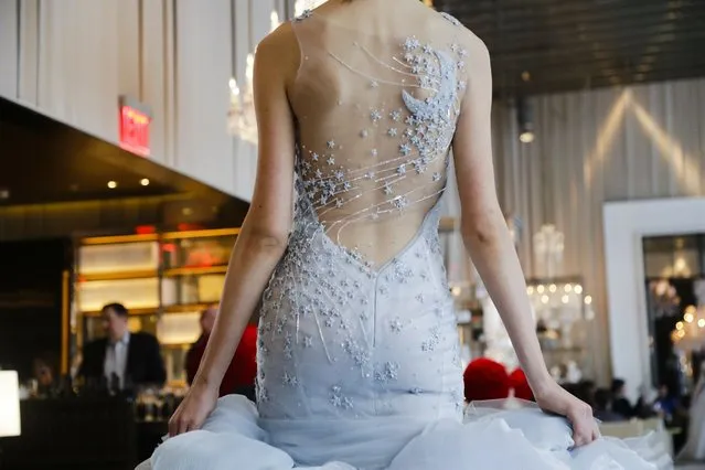 Fashion from the Ines Di Santo bridal collection is modeled Friday, April 12, 2019, in New York. (Photo by Frank Franklin II/AP Photo)