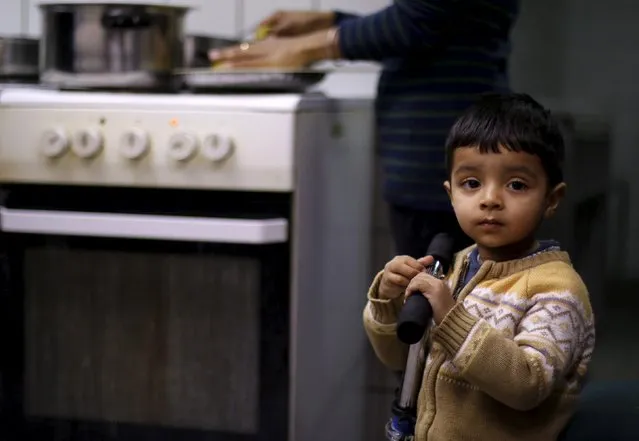 A boy from India stands in the kitchen of the accommodation for migrants “Spree Hotel” in Bautzen, Germany, March 22, 2016. (Photo by Ina Fassbender/Reuters)