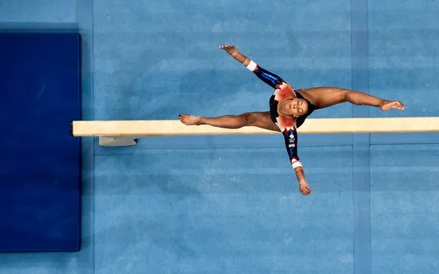 This aerial view shows Great Britain's Georgia-Mae Fenton competing in the balance beam event of the women's all-around qualification of the Artistic Gymnastics at the 2019 European Games in Minsk on June 27, 2019. (Photo by Kirill Kudryavtsev/AFP Photo)