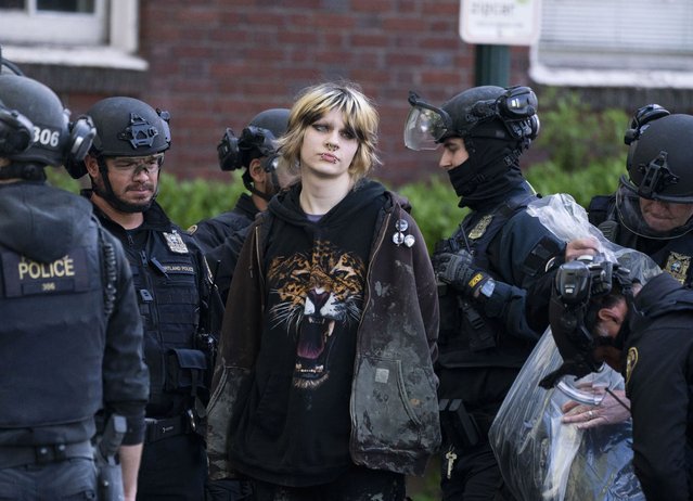 Several pro-Palestinian protesters who were occupying Portland State University's Millar Library were arrested at the school Thursday morning, May 2, 2024, in Portland, Ore., the third day the building had been occupied. (Photo by Beth Nakamura/The Oregonian via AP Photo)