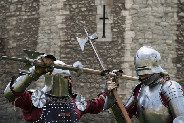 Historical interpreters Mark Griffin (R) and Tom Fermor during a poleaxe fighting demonstration at the Tower of London, ahead of the “Go Medieval at the Tower” festival at Tower of London on April 6, 2017 in London, England. The festival takes place from 29 April 2017 to 1 May 2017 and recreates the world of 1445 - offering knights sword fighting, crossbow shooting and appearances from Queen Margaret of Anjou and King Henry VI. (Photo by Chris J Ratcliffe/Getty Images)