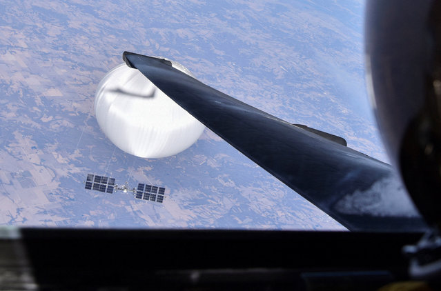 A U.S. Air Force U-2 pilot looks down at the suspected Chinese surveillance balloon as it hovers over the central continental United States on February 3, 2023 before later being shot down by the Air Force off the coast of South Carolina, in this photo released by the U.S. Air Force through the Defense Department on February 22, 2023. (Photo by U.S. Air Force/Department of Defense/Handout via Reuters)