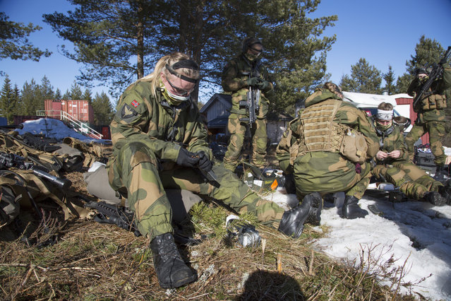 Soldiers reload their weapons at the Terningmoen Camp in Elverum, Norway on March 23, 2017. (Photo by Carolina Reid/NBC News)