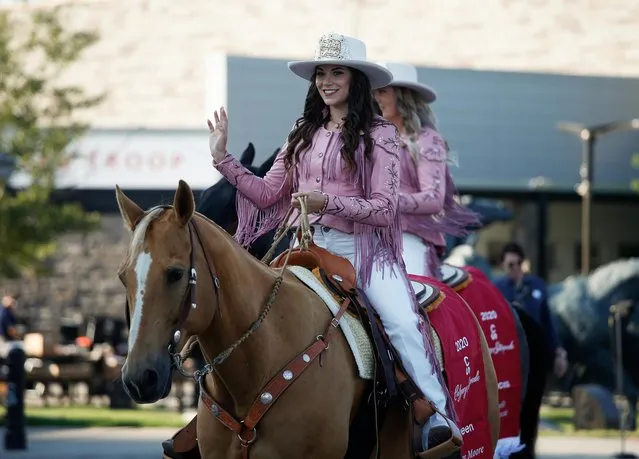Calgary Stampede Queen Kelcey Moore rides her horse in the parade as the Calgary Stampede gets underway following a year off due to the coronavirus disease (COVID-19) restrictions, in Calgary, Alberta, Canada on July 9, 2021. (Photo by Todd Korol/Reuters)