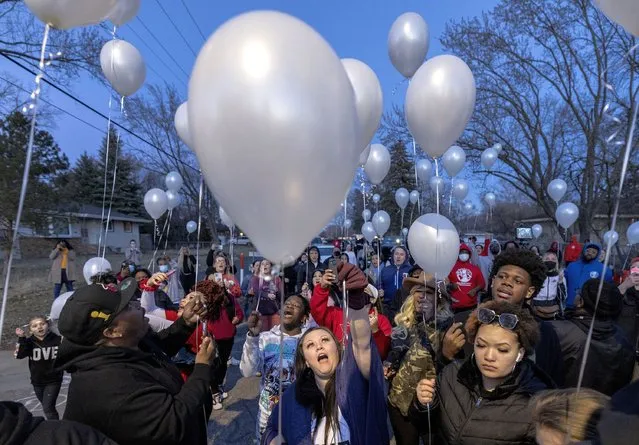 Katie Wright mother of Daunte Wright and attendees release balloons at a Vigil honoring Daunte Wright on one-year anniversary of his death Monday, April 11, 2022 in Brooklyn Center, Minn. (Photo by Carlos Gonzalez/Star Tribune)
