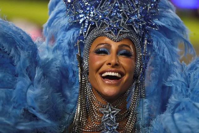 Drums queen Sabrina Sato from Unidos de Vila Isabel samba school performs during the second night of the Carnival parade at the Sambadrome in Rio de Janeiro, Brazil, April 23, 2022. (Photo by Pilar Olivares/Reuters)