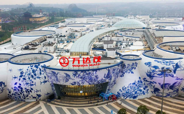 Buildings of Wanda Mall in shapes of blue and white porcelain are seen ahead of its official opening in Nanchang, Jiangxi Province, China, May 27, 2016. (Photo by Reuters/Stringer)