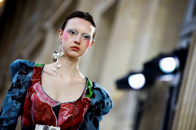 A model presents a creation by designer Andreas Kronthaler as part of his Fall-Winter 2023/2024 Women's ready-to-wear collection show for late designer Vivienne Westwood's namesake label during Paris Fashion Week in Paris, France on March 4, 2023. (Photo by Sarah Meyssonnier/Reuters)