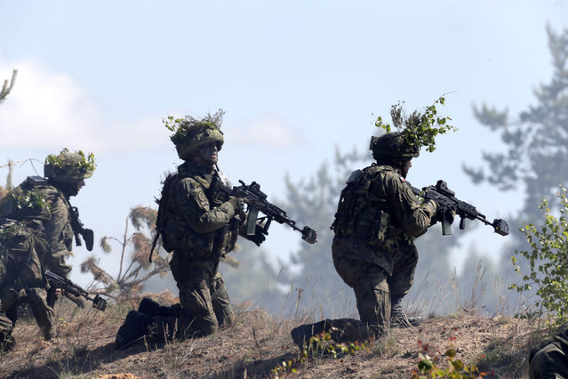 Polish army soldiers take part in the “Saber Strike” NATO military exercise in Adazi, Latvia, June 13, 2016. (Photo by Ints Kalnins/Reuters)