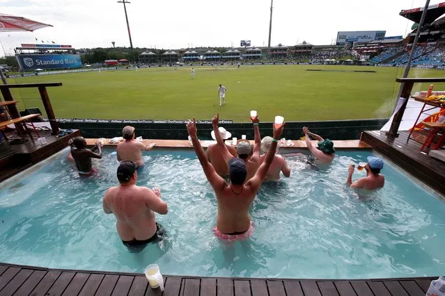 Fans watch the South Africa and England first test match from a pool in Centurion, South Africa, December 27, 2019. (Photo by Rogan Ward/Reuters)