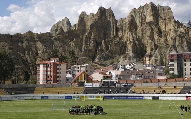 Bolivia's national soccer team huddles during a training season ahead of a World Cup qualifier against Colombia, in La Paz, Bolivia, Wednesday, October 9, 2024. (Photo by Juan Karita/AP Photo)