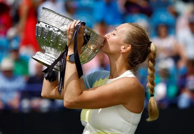 Petra Kvitova of Czech Republic celebrates with the trophy after victory against Jeļena Ostapenko of Latvia during the Women's Final on Day Eight of the Rothesay International Eastbourne at Devonshire Park on June 25, 2022 in Eastbourne, England. (Photo by Andrew Boyers/Action Images via Reuters)