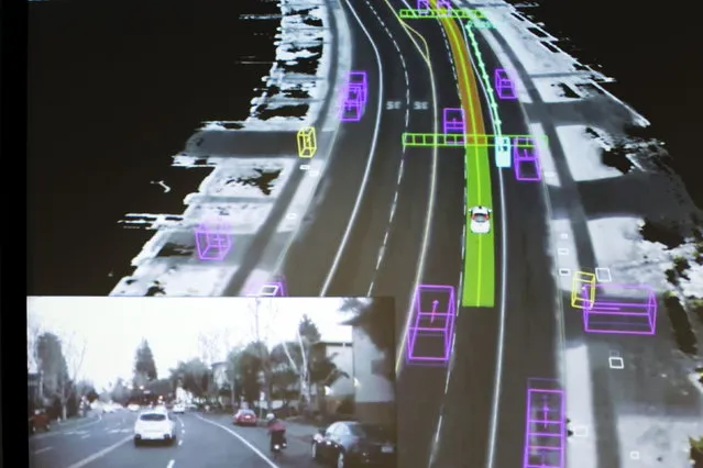 Video captured by a Google self-driving car, inset, is coupled with the same street scene as the data is visualized by the car during a presentation at a media preview of Google's prototype autonomous vehicles in Mountain View, California, 2015. (Photo by Elijah Nouvelage/Reuters)