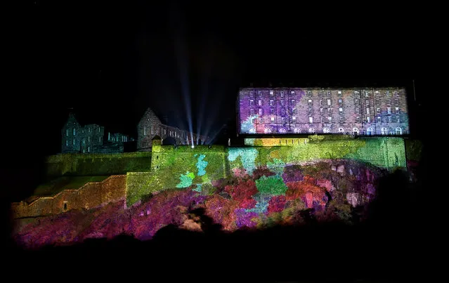 A digital light show called “Deep Time” is beamed onto Edinburgh Castle to mark the start of the Edinburgh Fringe Festival in Edinburgh, Scotland, Britain August 7, 2016. (Photo by Scott Heppell/Reuters)