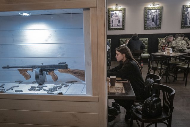 Citizens and Ukrainian soldiers spend time at cafe as the citizens try to continue their daily lives in a town of 60,000 people as the Russia-Ukraine war continues in Donbas near the frontline Avdiivka, Pokrovsk, Ukraine on December 02, 2023. (Photo by Marek M. Berezowski/Anadolu via Getty Images)