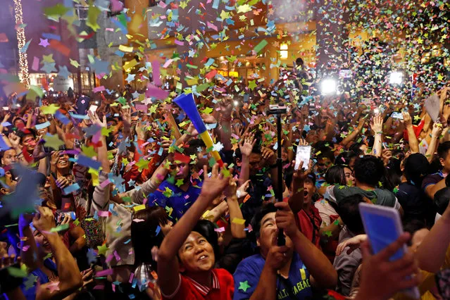 People celebrate New Year at Eastwood mall in Quezon City Metro Manila in the Philippines on December 31, 2017. (Photo by Erik De Castro/Reuters)