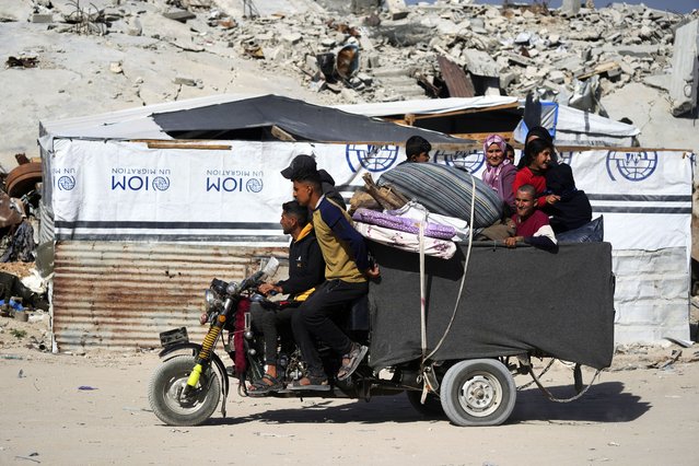 Displaced Palestinians fleeing Beit Lahia amid ongoing Israeli military operations in the Gaza Strip arrive in Jabalia, northern Gaza, on Friday, May 16, 2025. (Photo by Jehad Alshrafi/AP Photo)