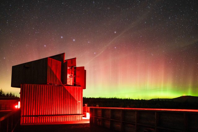 Picture dated October 2nd, 2022 shows the Northern Lights over Northumberland, United Kingdom. (Photo by Dan Monk/Bav Media)