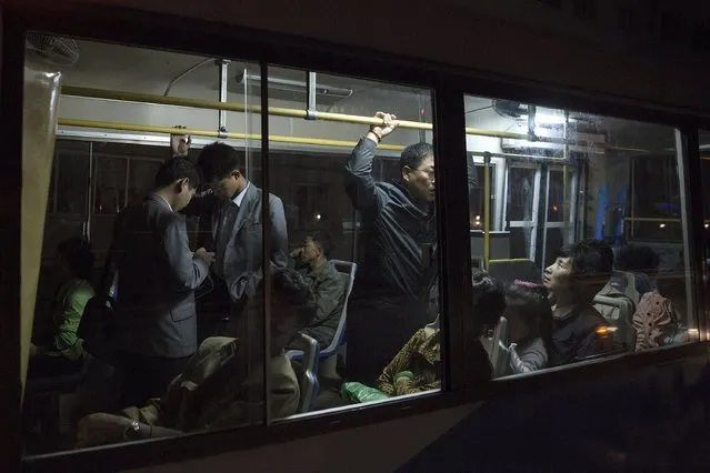 People take a public bus in Pyongyang late October 7, 2015. (Photo by Damir Sagolj/Reuters)