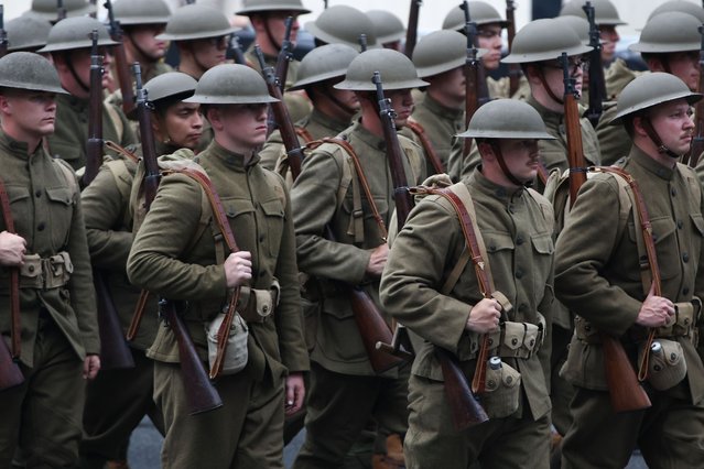 Soldiers dressed in World War I uniforms march in the military parade on June 14, 2025 in Washington, DC. The U.S. Army is marking its 250th anniversary with a military parade along Constitution Avenue that includes roughly 6,600 troops, 150 vehicles, and over 50 aircraft. The parade, which coincides with President Donald Trump's 79th birthday, is designed to tell the history of the Army. (Photo by Samuel Corum/Getty Images)