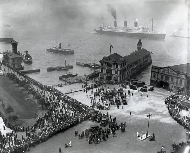 Thousands of people gather to welcome aviator Amelia Earhart Putnam at the Battery in New York City on June 20, 1933. The crowd cheered Earhart, who flew her plane from Newfoundland to Ireland in 15 hours one month ago. (Photo by AP Photo)
