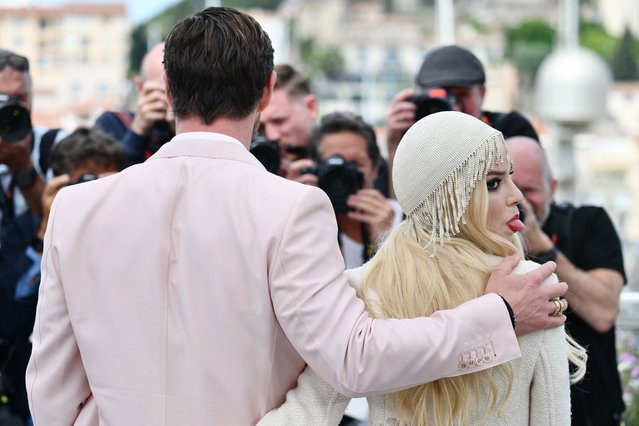 British-American actress Anya Taylor-Joy sticks out her tongue as she poses during a photocall for the film “Furiosa: A Mad Max Saga” at the 77th edition of the Cannes Film Festival in Cannes, southern France, on May 16, 2024. (Photo by Christophe Simon/AFP Photo)