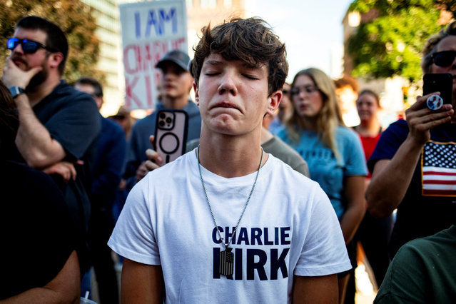 Nolan Ferraro, 13, closes his eyes during a rally hosted by members of the Michigan Republican Party to remember conservative activist Charlie Kirk, who was fatally shot during an event at Utah Valley University, in Lansing, Michigan, U.S., September 15, 2025. (Photo by Emily Elconin/Reuters)