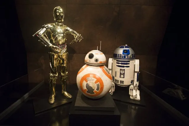 Characters C-3PO (L), BB-8 and R2-D2 (R) from Star Wars are pictured at the Discovery Store Times Square in the Manhattan borough of New York November 11, 2015. (Photo by Carlo Allegri/Reuters)