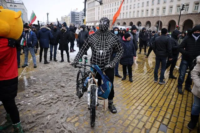 A man dressed in a Spiderman costume takes part in a protest of restaurant, bar and club owners and employees against the closures of their outlets, demanding that they be allowed to open in February, as the Balkan country is easing some of its coronavirus disease (COVID-19) related restrictions, Sofia, Bulgaria, January 27, 2021. (Photo by Stoyan Nenov/Reuters)