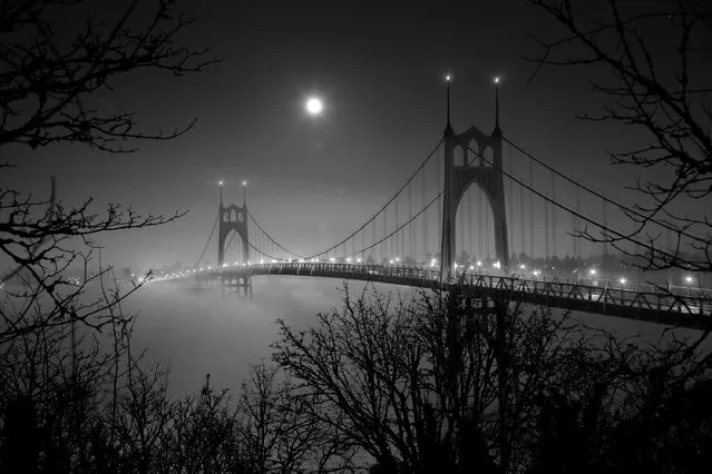 “Haunting moonrise”. A full moon over St. John's bridge in Portland, Oregon. (Photo and caption by Fred An/National Geographic Traveler Photo Contest)