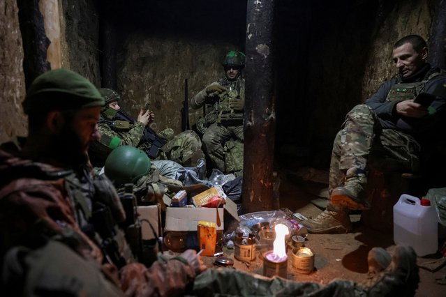 Servicemen of the 49th Separate Assault Battalion Carpathian Sich of the Armed Forces of Ukraine rest in a dugout at a position in the frontline town of Kostiantynivka in Donetsk region, Ukraine on December 7, 2025. (Photo by Anatolii Stepanov/Reuters)