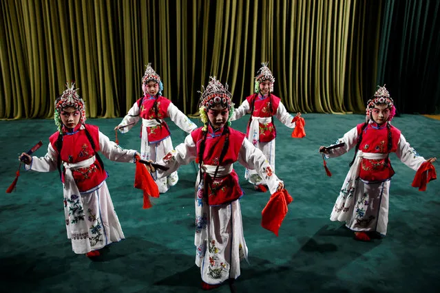 Participants perform during a traditional Chinese opera competition at the National Academy of Chinese Theatre Arts in Beijing, China, November 26, 2016. (Photo by Thomas Peter/Reuters)
