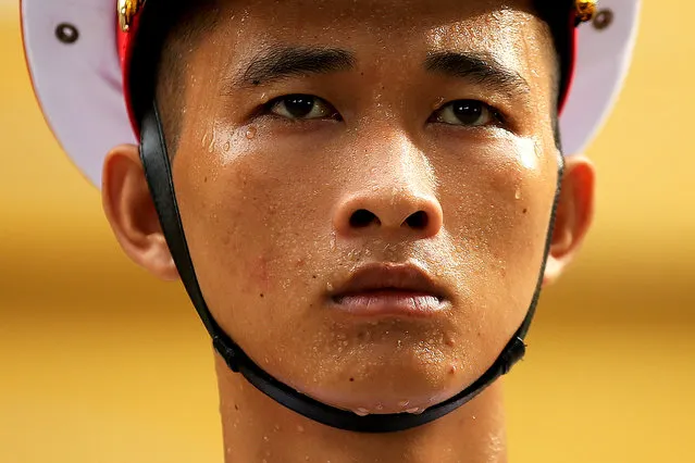 A member of the honor guard participates in the Association of South East Asian Nations (ASEAN) flag raising ceremony at the Ministry of Foreign Affair in Hanoi, Vietnam, 08 August 2018. The ceremony is to mark the 51st anniversary of founding of ASEAN. (Photo by Luong Thai Linh/EPA/EFE)