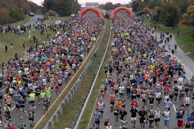 Runners start the 48th Marine Corps Marathon, in Arlington, Va., Sunday, October 29, 2023. (Photo by Jose Luis Magana/AP Photo)