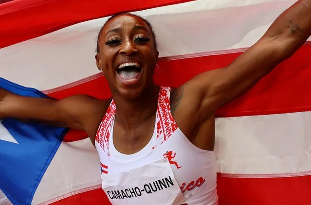 Jasmine Camacho-Quinn of Puerto Rico celebrates after winning gold in the women's 100-meter hurdles final at the Tokyo Olympics on August 2, 2021, at the National Stadium in Tokyo. (Photo by Kai Pfaffenbach/Reuters)