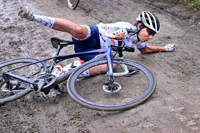 French cyclist Eugenie Duval falls during the first edition of the women elite race of the “Paris-Roubaix” cycling event, 116,5km from Denain to Roubaix, on October 2, 2021. (Photo by Eric Lalmand/Belga via AFP Photo)
