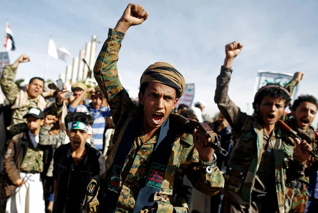 Supporters of the Houthi movement shout slogans as they attend a rally to mark the 4th anniversary of the Saudi-led military intervention in Yemen's war, in Sanaa, Yemen March 26, 2019. (Photo by Khaled Abdullah/Reuters)