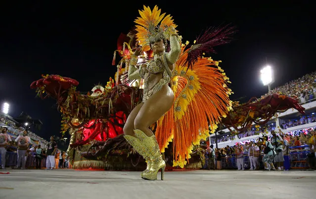 A reveller from Uniao da Ilha samba school performs during the second night of the carnival parade at the Sambadrome in Rio de Janeiro, Brazil February 27, 2017. (Photo by Pilar Olivares/Reuters)