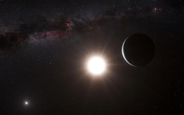 An artist's impression shows the planet orbiting the star Alpha Centauri B, a member of the triple star system that is the closest to Earth. Our own Sun is visible to the upper right. (Photo by Reuters/ESO)