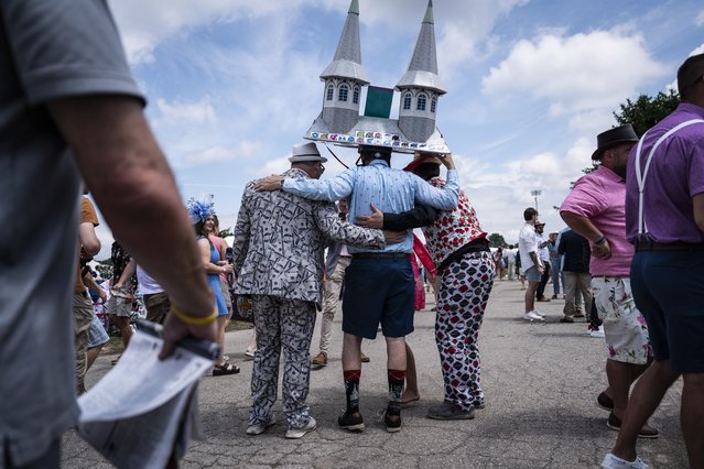 Spectators pose for photos in the infield before the 150th running of the Kentucky Derby at Churchill Downs in Louisville, KY on Saturday, May 04, 2024. (Photo by Jabin Botsford/The Washington Post)