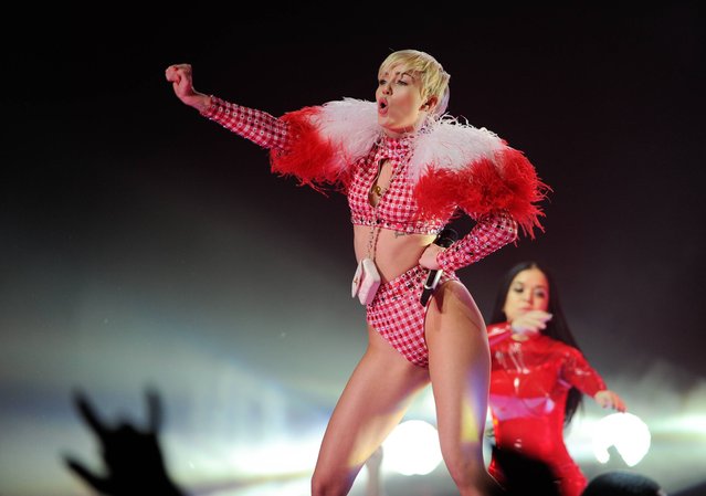 Singer Miley Cyrus performs at the Barclays Center on Saturday, April 5, 2014 in New York. (Photo by Evan Agostini/AP Photo/Invision)