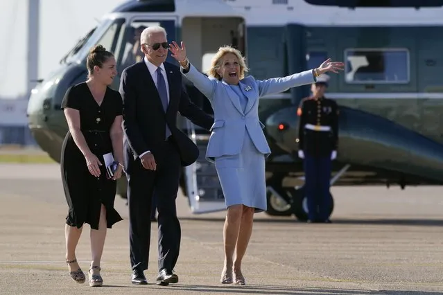 First lady Jill Biden reacts as she and President Joe Biden meet veterans of the British Armed Forces before boarding Air Force One at Heathrow Airport in London, Sunday, June 13, 2021. (Photo by Patrick Semansky/AP Photo)