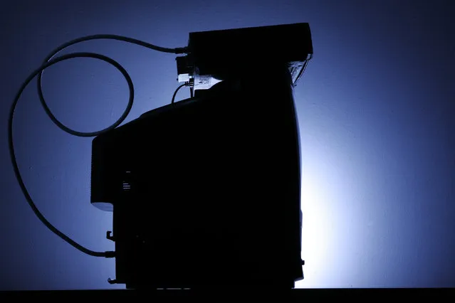 In this May 30, 2007 file photo, a cable box is seen on top of a television in Philadelphia. Pay-TV customers with regular set-top boxes could soon record programs without a DVR. (Photo by Matt Rourke/AP Photo)