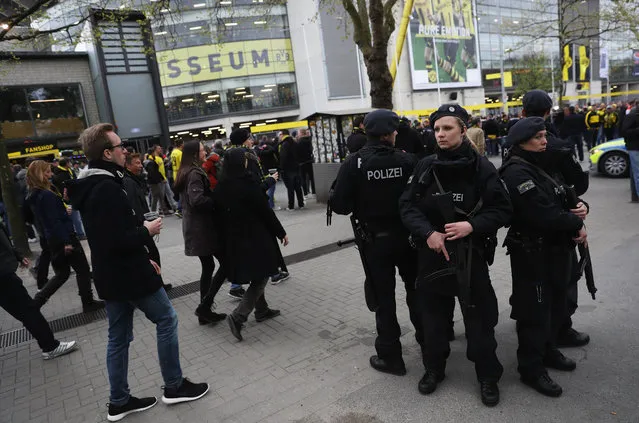 Police patrol outside the ground prior to the UEFA Champions League Quarter Final first leg match between Borussia Dortmund and AS Monaco at Signal Iduna Park on April 12, 2017 in Dortmund, Germany. The match was rescheduled after an alleged terrorist attack on the Borussia Dortmund team coach as it made it's way to the stadium. (Photo by Maja Hitij/Bongarts/Getty Images)