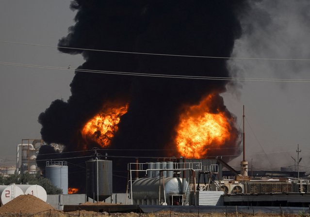 Smoke rises following a fire at an oil refinery, on the outskirts of Erbil, Iraq, on June 13, 2024. (Photo by Khalid Al-Mousily/Reuters)