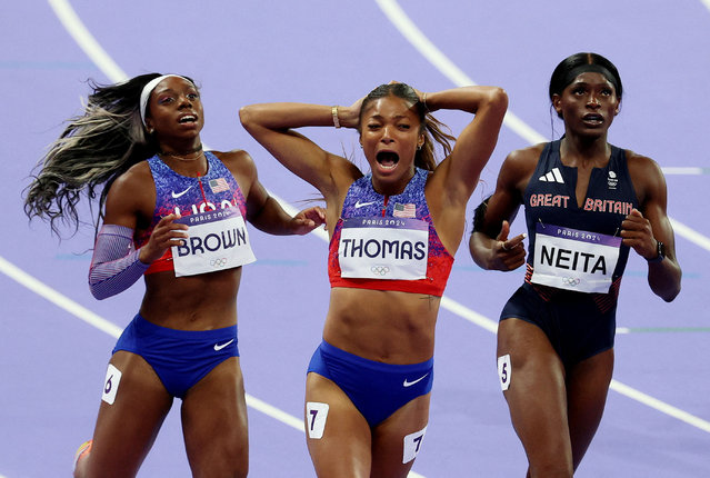 Gabrielle Thomas (C) of the United States reacts after winning the women's 200-meter final at the Paris Olympics on Aug. 6, 2024, at Stade de France in Saint-Denis, near Paris. (Photo by Phil Noble/Reuters)