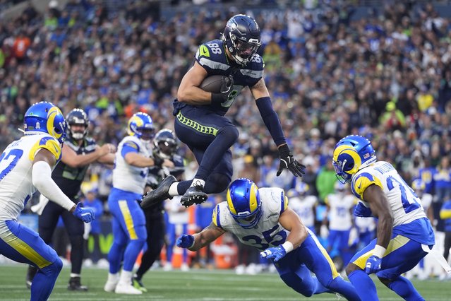 Seattle Seahawks tight end AJ Barner (88) hurdles over Los Angeles Rams linebacker Jacob Hummel (35) during the second half of an NFL football game in Seattle, Sunday, November 3, 2024. (Photo by Lindsey Wasson/AP Photo)