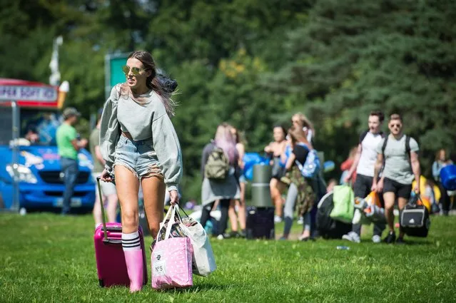 Festival goers arrive at V Festival, Weston Park, Staffordshire, England on August 18, 2017. (Photo by SWNS:South West News Service)