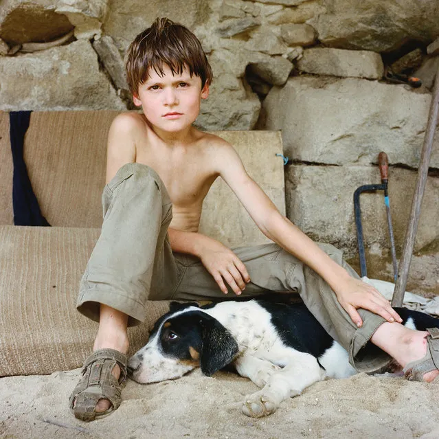 This boy lives with his father on an adjacent property in the Pyrenees. They similarly live off the land without electricity. (Photo by Antoine Bruy)