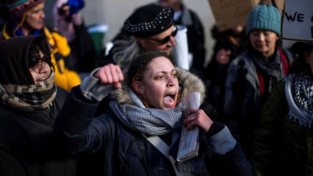 A protester shouts slogans against Trump as people participate in a National Day of Protest on Presidents' Day at Washington Square Park in New York City on February 17, 2025. (Photo by Eduardo Munoz/Reuters)